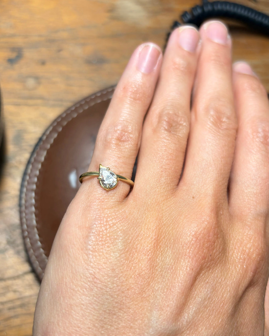 tilted pear diamond ring