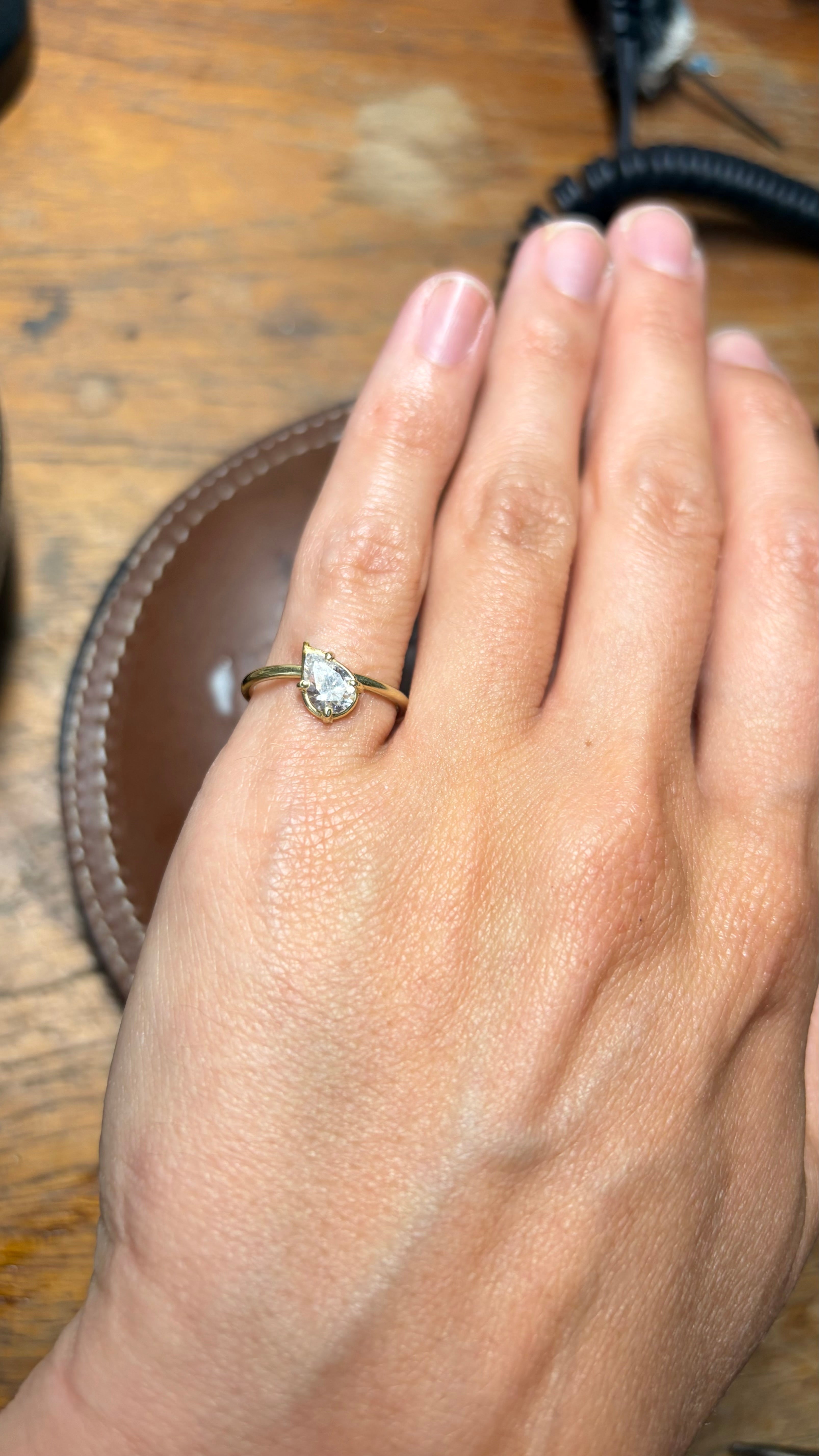 tilted pear diamond ring