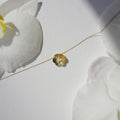 diamond poppy pendant