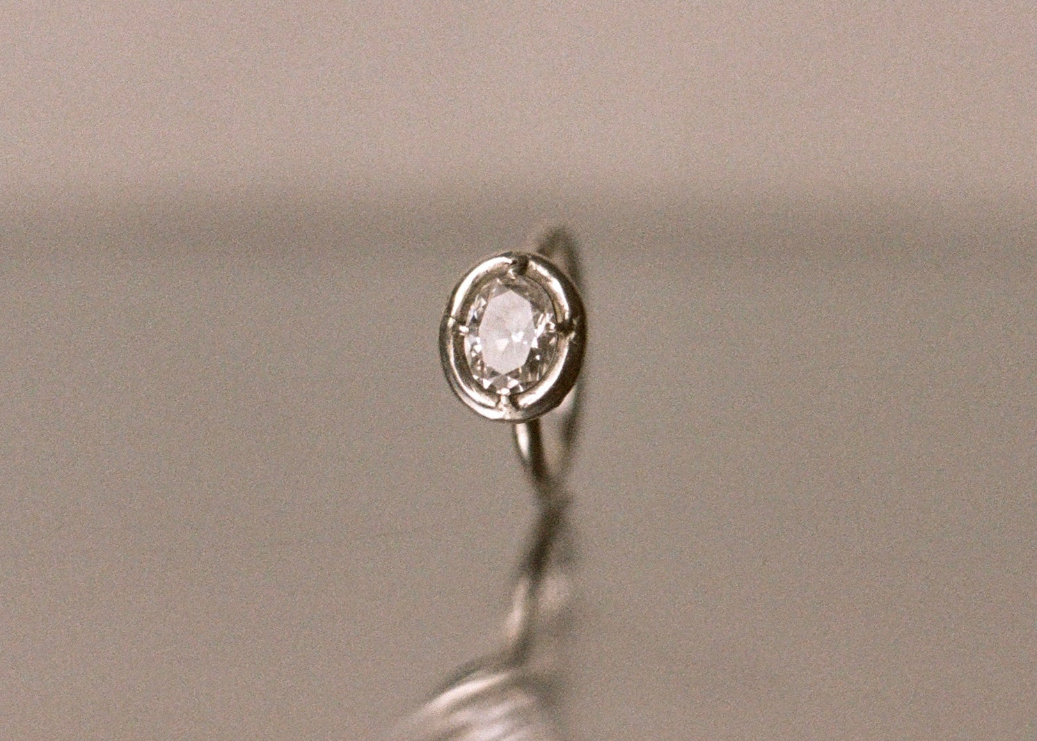 east-west diamond ring