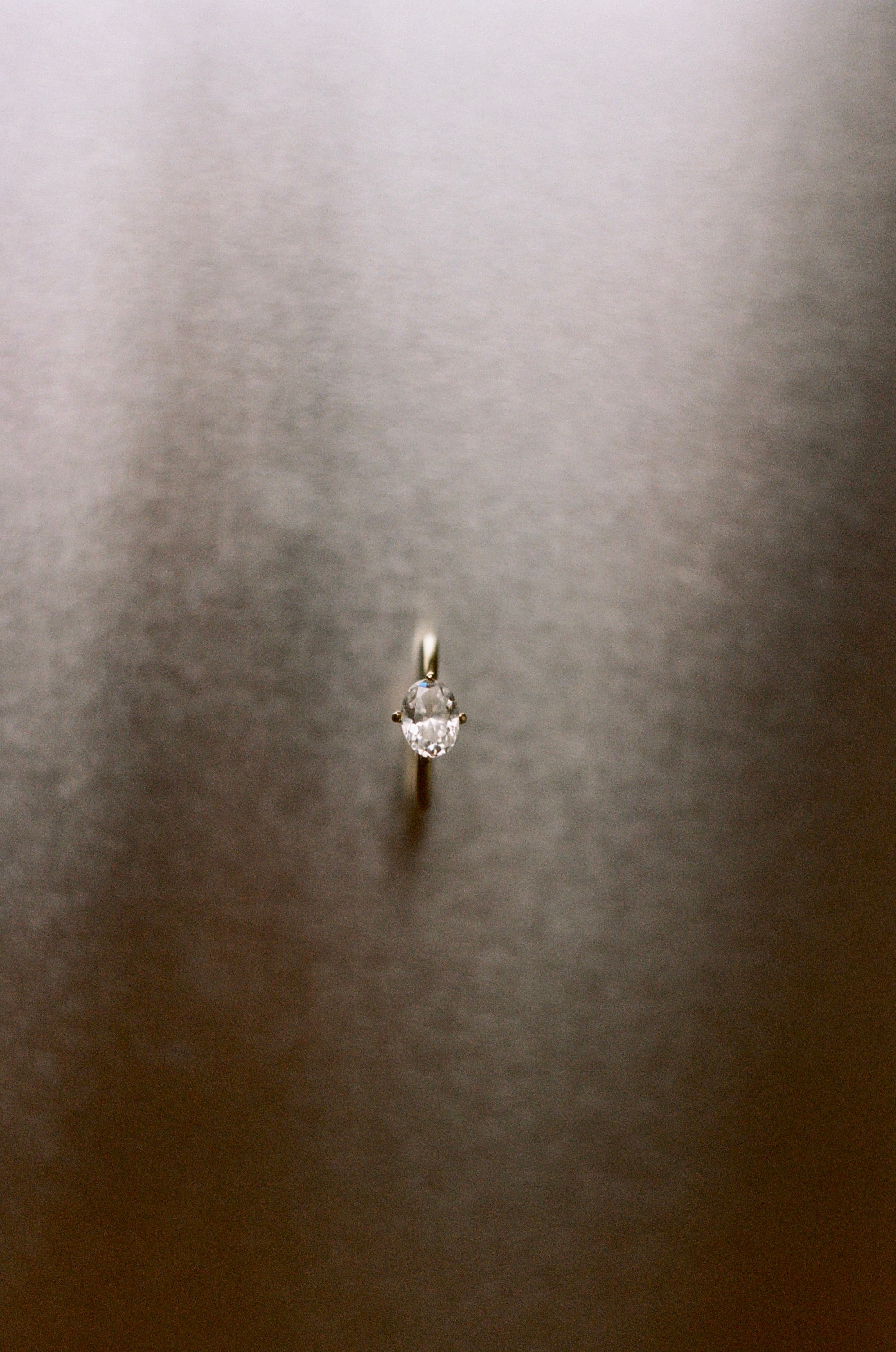 east-west claw-set diamond ring