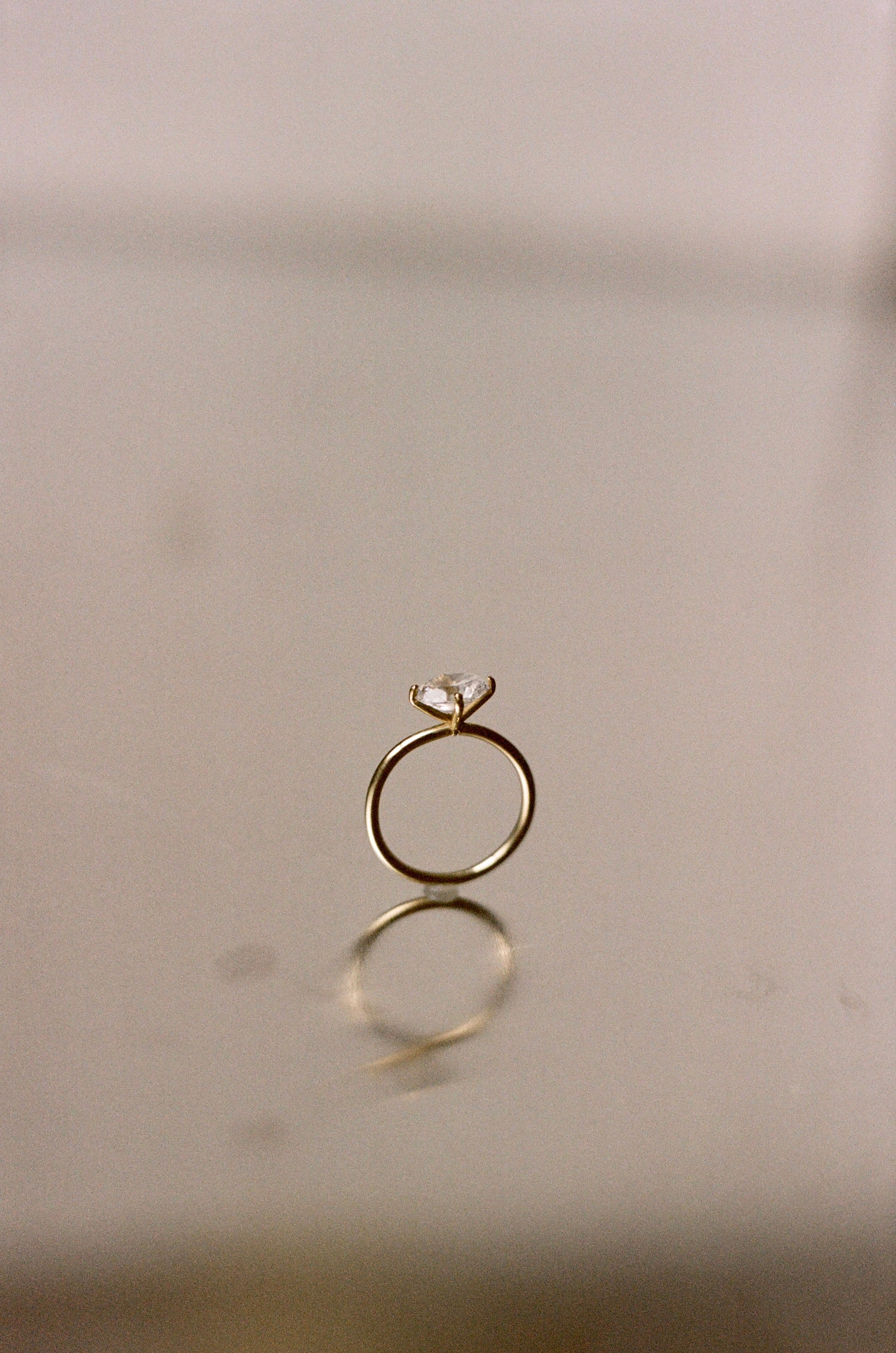 east-west claw-set diamond ring