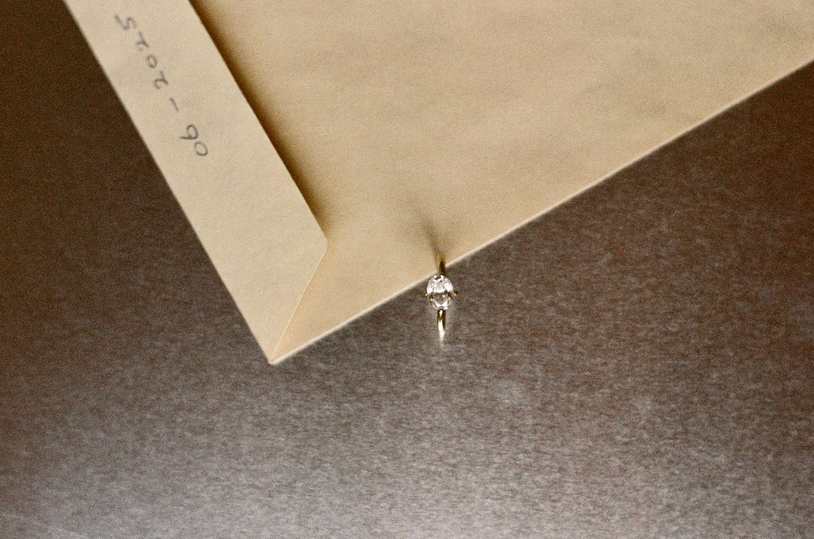 east-west claw-set diamond ring