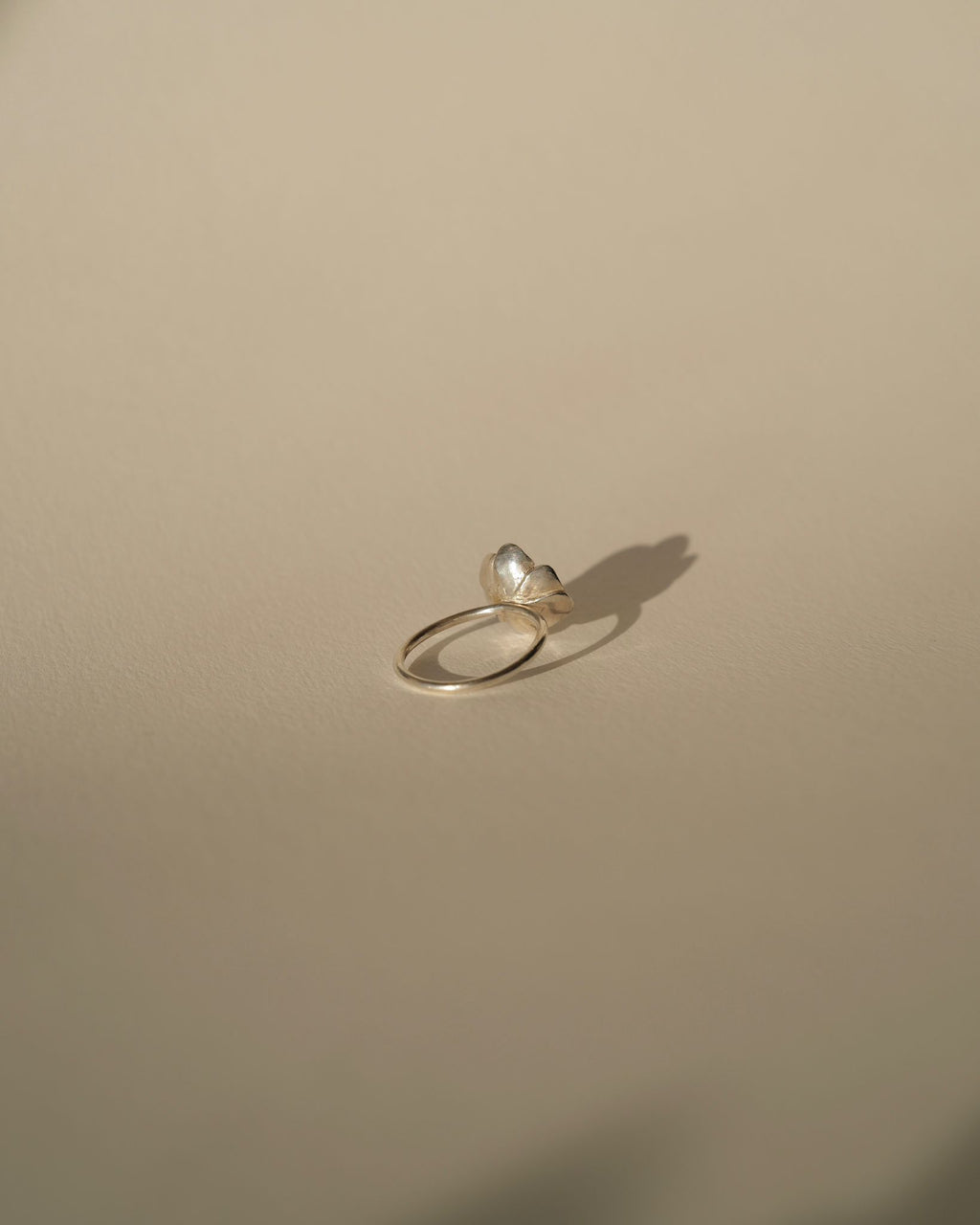 a diamond poppy ring
