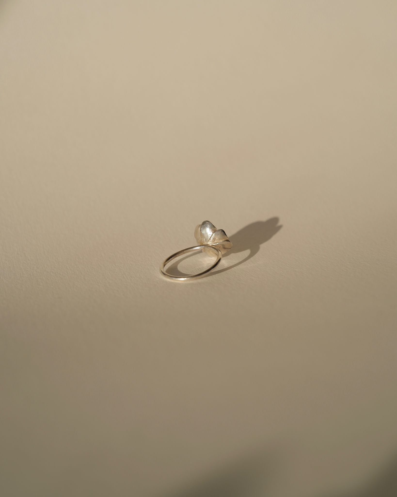 a diamond poppy ring