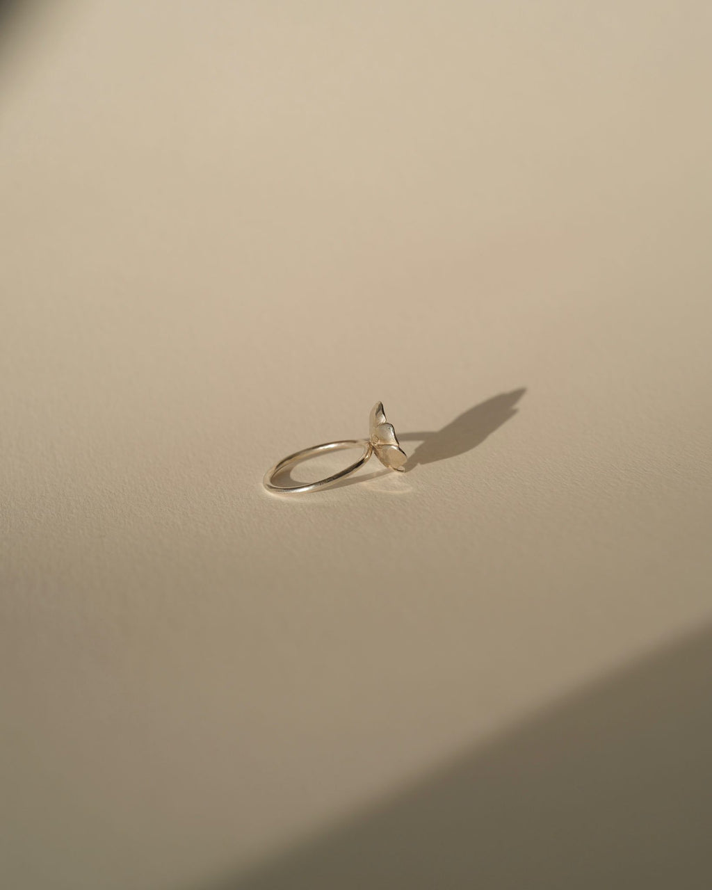 a diamond poppy ring