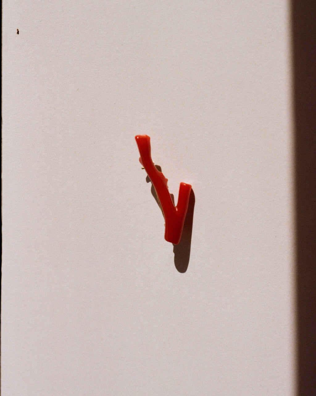 coral and gold brooch