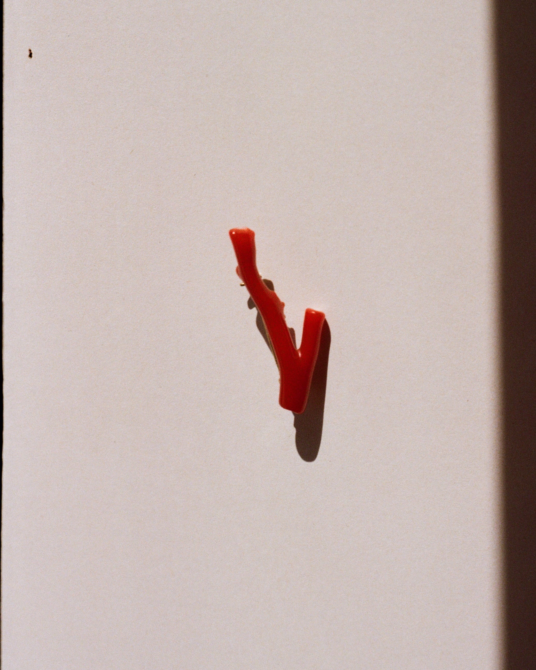 coral and gold brooch