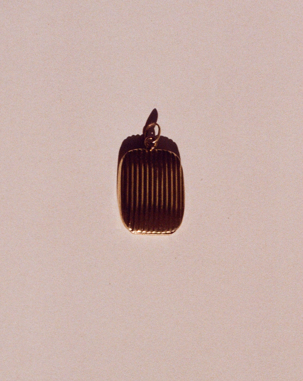 modernist 14k gold pendant