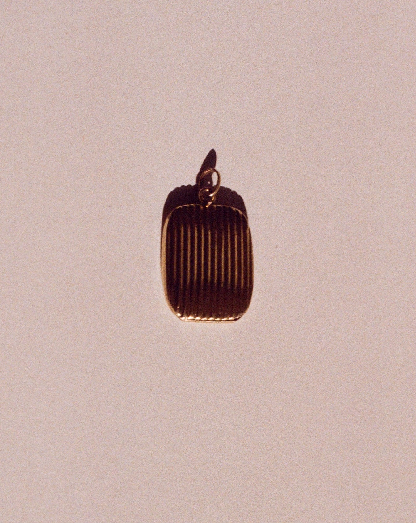 modernist 14k gold pendant